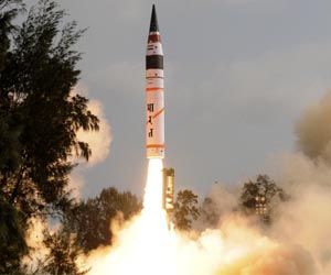 India wheels out new long-range missile in annual parade