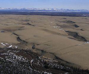 SwRI study suggests debris flows on frozen arctic sand dunes are similar to dark dune spot-seepage flows on Mars