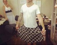 Shorts banned in Brazil heat, worker opts for skirt