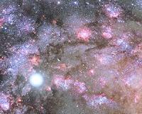 NASA Telescopes Uncover Early Construction of Giant Galaxy