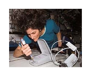Woman takes command of ISS after crew return