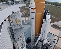 Atlantis' Payload Is Delivered; Astronauts Return To Kennedy