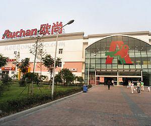 Auchan supermarkets reports profit rise on action in China