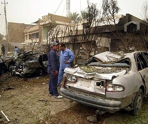 Market blasts kill 20 in Baghdad area