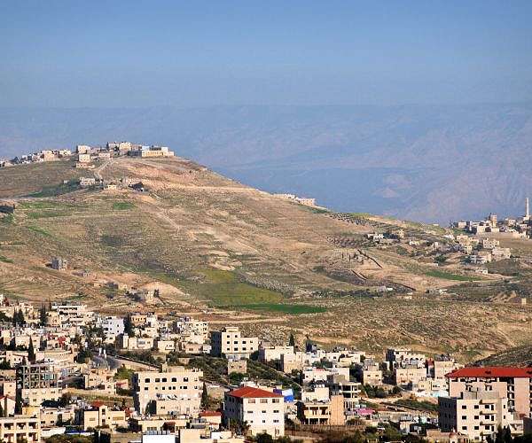 Gunman kills 3 Israelis at West Bank crossing as Gaza war rages