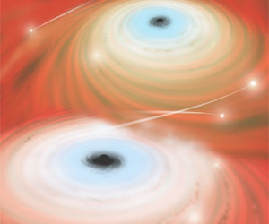 Two Black Holes Weigh In at 10 Billions Suns