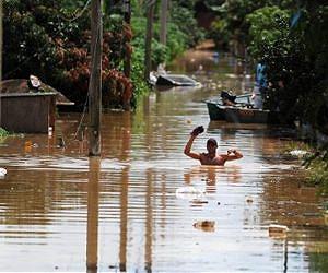 Death toll in Brazil floods, landslide rises to 33
