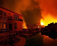 Florida wildfires ravage dozens of homes