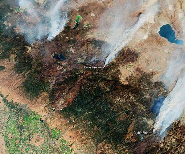 Massive California fire eases with rains