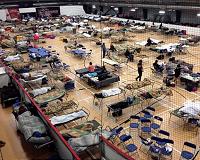 Tensions simmer at Canada fire evacuee centers