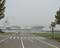 China arrests man who photographed base for 'foreign spy'