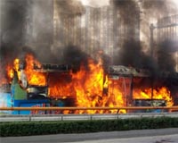 Police call for public's help in China bus blaze probe