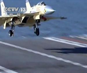 China conducts first landing on aircraft carrier