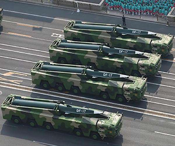 Beijing shows off drones, missiles and lasers in military parade