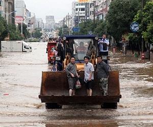 China flood deaths rise, more rain expected