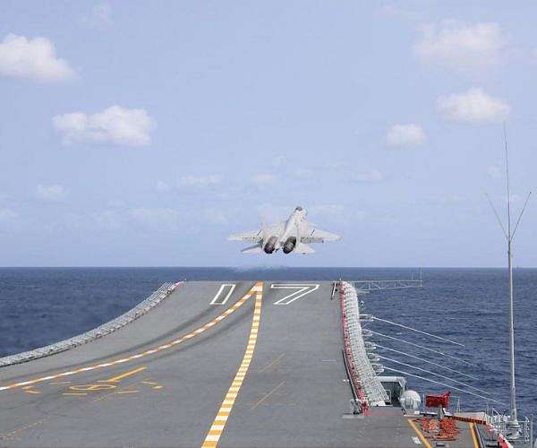 China says drills near Taiwan 'routine training', rejects 'hype'