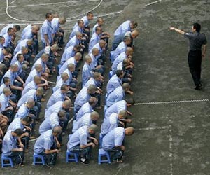 Rights abuses persist in China despite plan to scrap camps: Amnesty