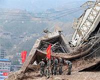 Rescuers race against time after China landslide leaves 85 missing