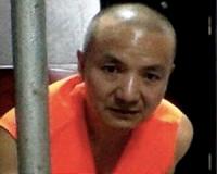 China upholds jail terms for anti-corruption activists