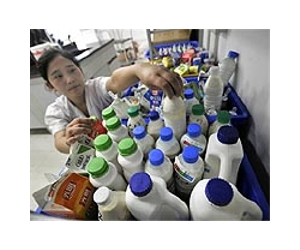 Chinese dairy execs jailed over tainted milk: state media