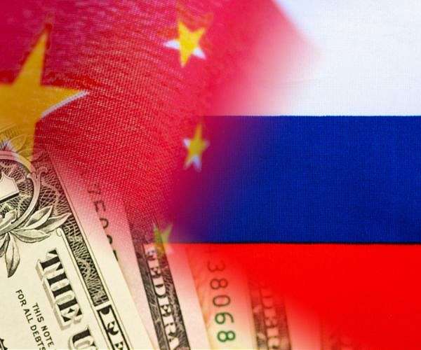 Xi tells Putin China glad to see improved US-Russia relations