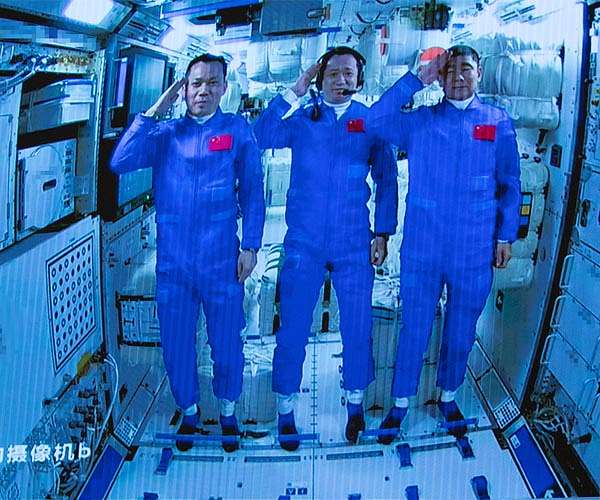 Astronauts board China's new space station for first time