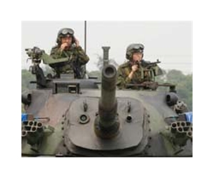 Taiwan to cut 9,200 troops as China ties warm