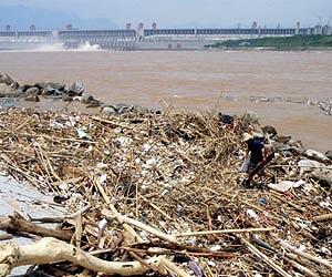 Mountains of trash fished from China's Three Gorges Dam