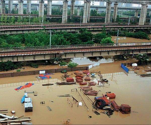 Death toll from northwest China floods rises to 13
