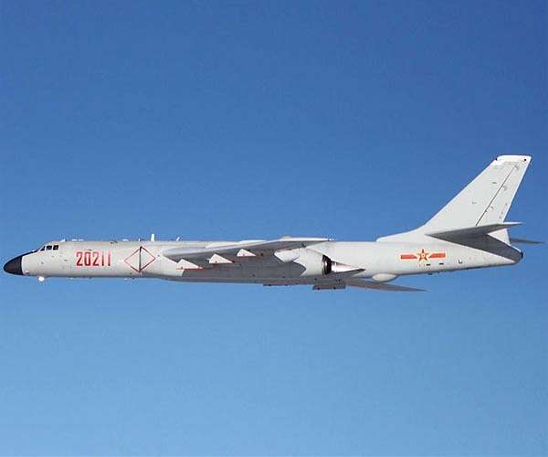 China sends 56 jets into Taiwan defence zone in another record incursion