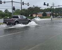 Floodwaters rise as killer storm stalks southeastern US