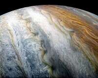 Study helps solve mystery under Jupiter's coloured bands