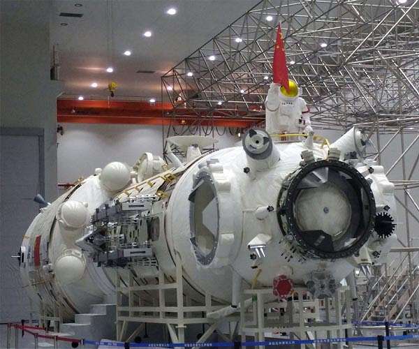 China's space station core module, cargo craft pass factory review