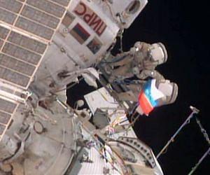 Cosmonauts Complete Spacewalk, Unfold Russian Flag in Space