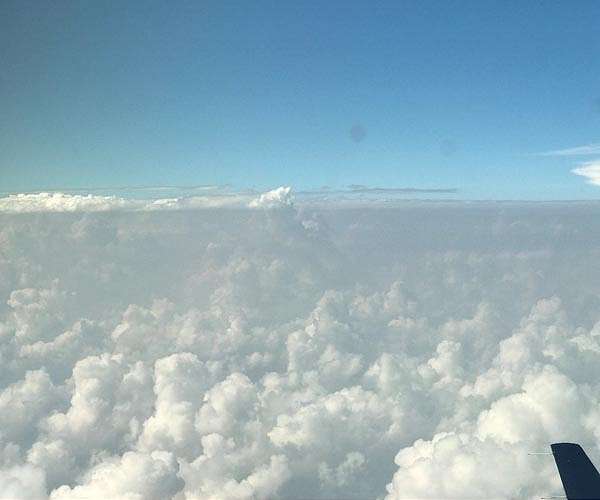 Flying with the clouds