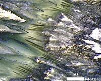 NASA Mars Orbiters See Clues to Possible Water Flows