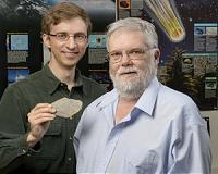 Meteorite material born in molten spray as embryo planets collided