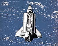Shuttle Discovery heads back to Earth