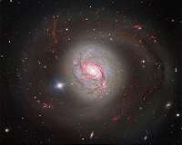 Minor merger kicks supermassive black hole into high gear