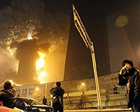 Chinese TV employee among 12 held over fire: police