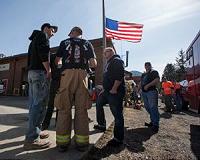 US landslide towns divided by mud, united by grief