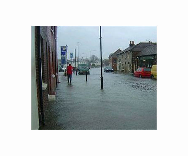 Storm Henk causes flooding and travel disruption in UK