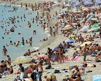 France's washout summer fails to deter tourists