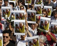 Silent march for French slain hostage