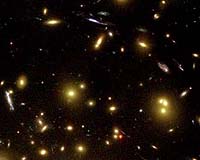 Hubble Watches Comet Galaxy Ripped Apart By Galaxy Cluster