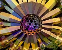 Captured electrons excite nuclei to higher energy states