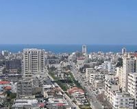 Israel hits Gaza highrises as sides weigh truce deal