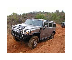 Arnie defends his Hummer fleet as eco-friendly