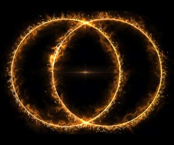 Giant double-ring radio galaxy found halfway across the unhgerse