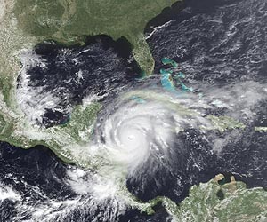 Ernesto moves across southeastern Mexico as tropical storm
